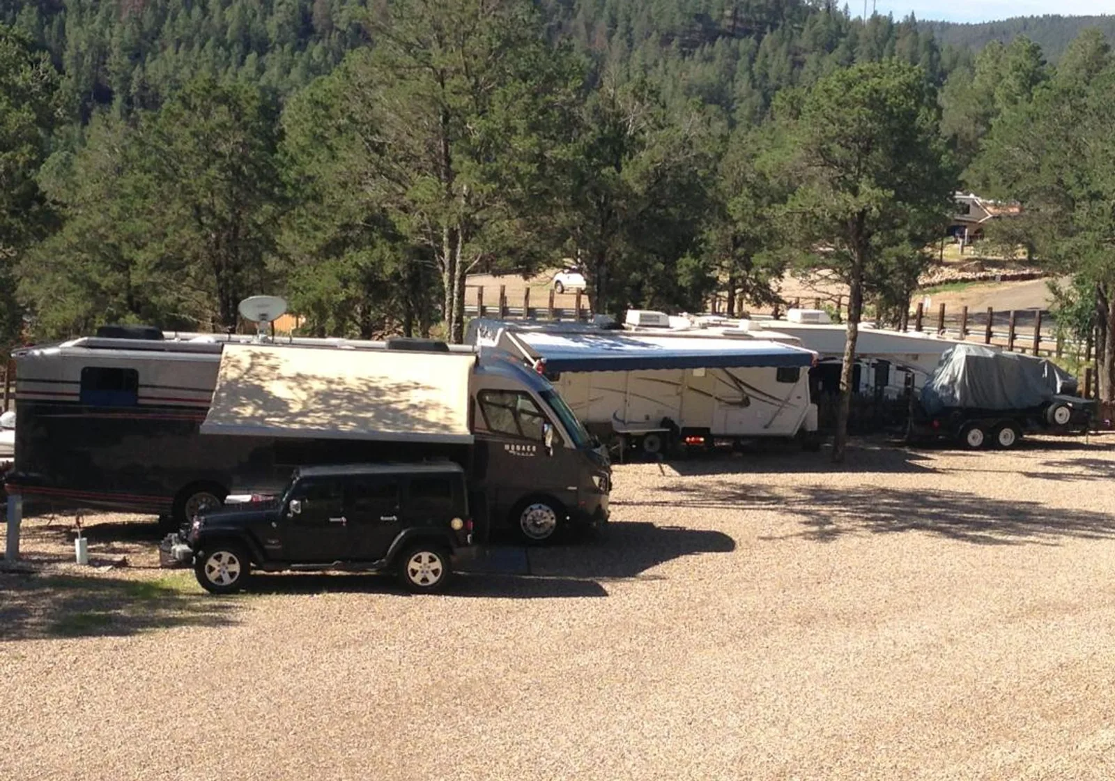 Gravel sites with mountain forest backdrop